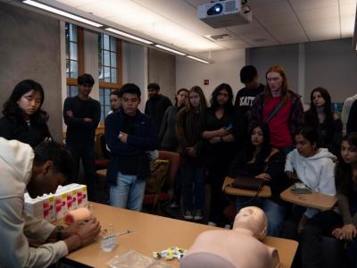 Shubham Bansal, Executive Director of Narcare, demonstrates how to use an injectable naloxone during one one of their training session at Savery Hall on University of Washington, on Oct. 14, 2024.