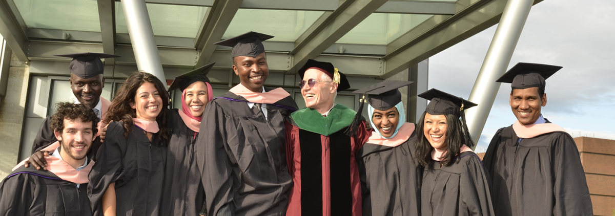 Photo of Steve Gloyd with graduates.
