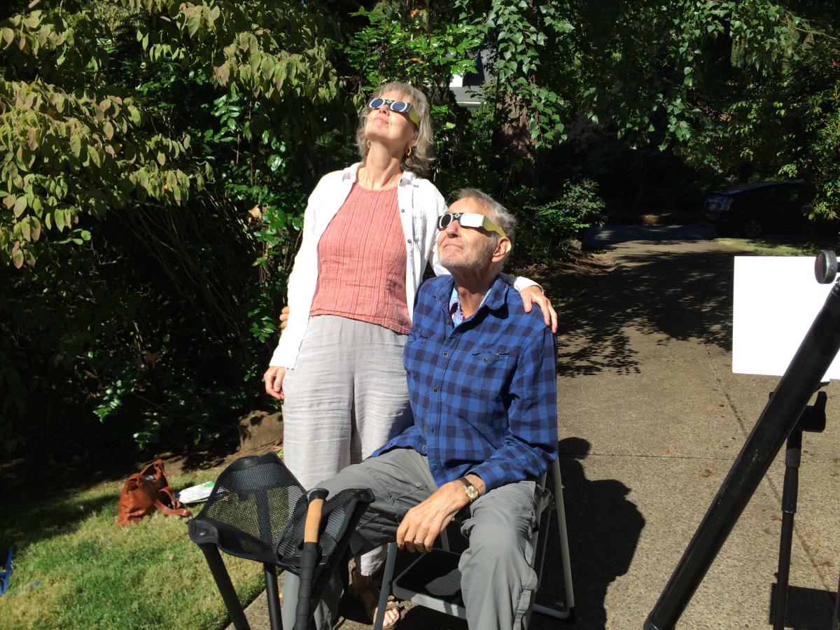 Mary Anne Mercer and Steve Bezruchka watch the eclipse