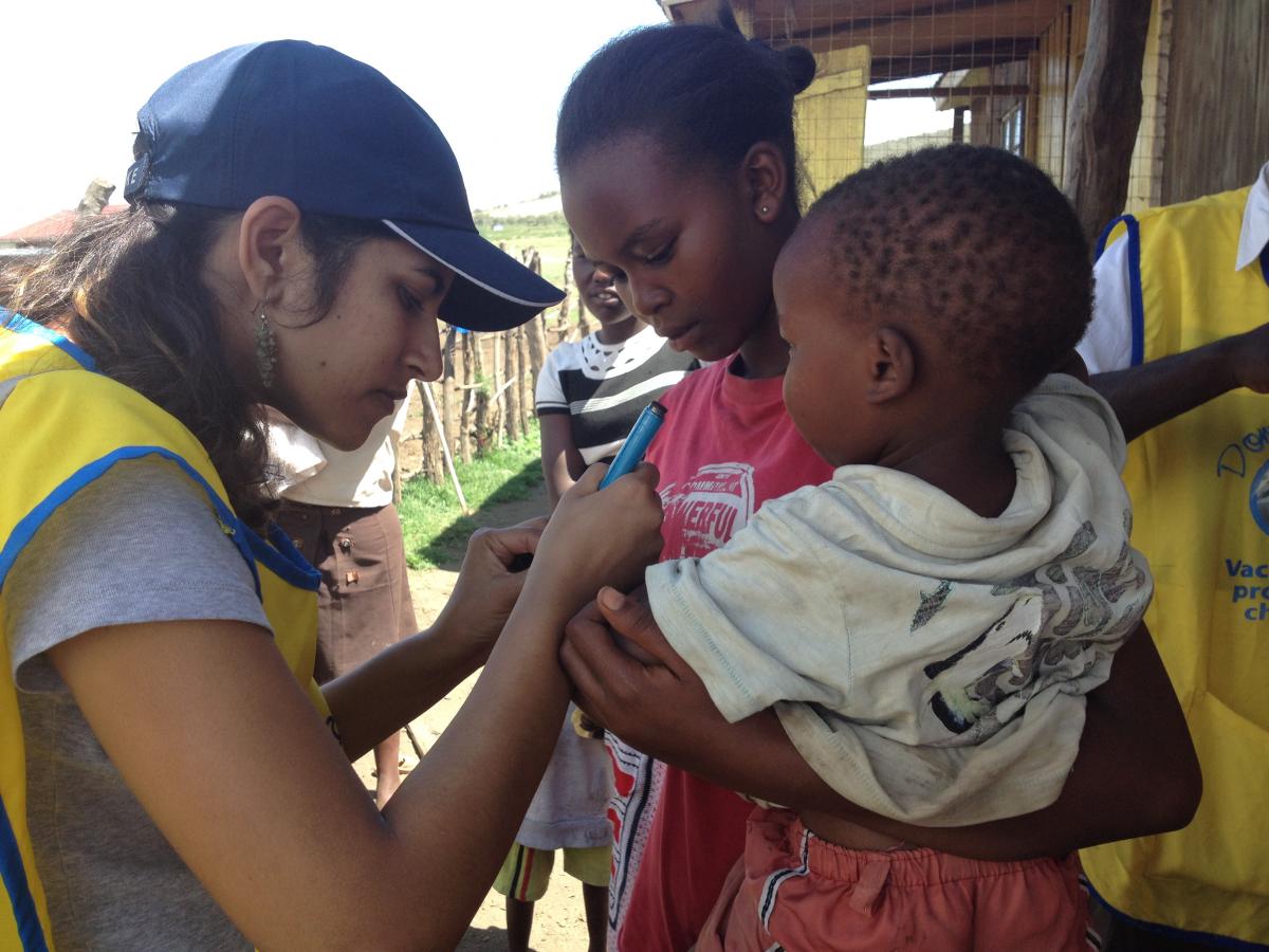 A resident provides a polio test in Kenya